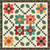 Riley Blake Fabrics Heather Peterson Daisy Chain Quilt Pattern, colorful patchwork quilt with floral flower designs and a black floral border.
