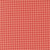 Moda Fabrics Poinsettia and Pear Sherri & Chelsi Houndstooth Geranium Red, fabric featuring a red and pink houndstooth pattern.