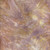 Batik Textiles Batik Fabrics Brown Blue Pink Micro Dots, close-up of colorful fabric with small pastel dots on a marble-like background.