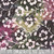 Riley Blake Fabrics Backyard Birds Batiks Spunky Cream Deep Purple Flower Vine, multicolor fabric with floral and vine pattern.