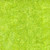 Timeless Treasures Fabrics Tonga Batiks Raven Halloween Packed Wavy Dots Wicked Green, bright green fabric with wavy dotted pattern.