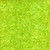 Timeless Treasures Fabrics Tonga Batiks Raven Halloween High Tide Slime Green, batik fabric with lime green and darker green swirling patterns.