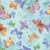 Timeless Treasures Fabrics Love Spell Tossed Butterflies Sky Blue, fabric featuring colorful butterflies in shades of orange, yellow, purple, green, and blue on a light blue background.