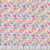 Timeless Treasures Fabrics Love Spell Confetti Diamonds Multi Pink Red, colorful fabric with diamond-shaped confetti pattern in pink, red, purple, green, blue, and yellow hues.