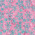 Windham Fabrics Anthology Batiks Jacqueline de Jonge Wonderful Feeling Pink Snowflakes, close-up of pink fabric with blue snowflake patterns and silver dots.