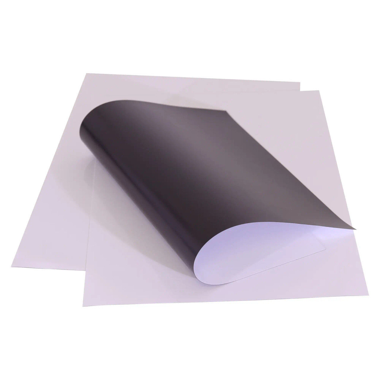 Magnetic Flexible Photo Paper A4, Three Sheets, Black on One Side and White on the Other, Showcased in a Rolled and Partially Unrolled State for Versatile Photo Printing.