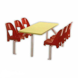 Six-Seater Canteen Rectangular Alpine Set DA6, a colorful plastic canteen table with six attached red chairs around a rectangular yellow tabletop.