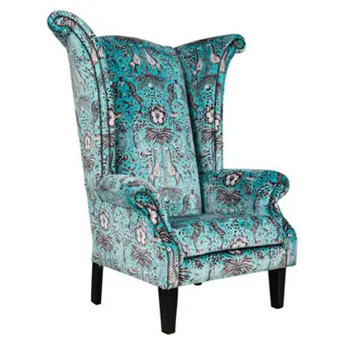 Berlin Wingback Chair, stylish upholstered wingback armchair with vibrant blue and floral fabric design, wooden legs, and high back for comfortable seating. Berlin Wingback Chair, stylish upholstered wingback armchair with vibrant blue and floral fabric design, wooden legs, and high back for comfortable seating.
