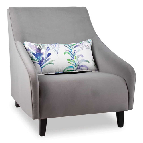 Auckland Sofa Chair FUR-SCH-AUC, a modern grey upholstered armchair with curved arms and wooden legs, complemented by a decorative floral patterned pillow.