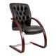Adda Wooden Integral Sleigh Base Visitor Office Chair, black leather padded office chair with wooden sled-style base and tufted backrest.