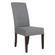 Israel Dining Chair, gray upholstered high-back dining chair with dark wooden legs.