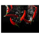 Chilli Hob Splashback, vibrant red chillies splashing into water with bubbles, on a black background.