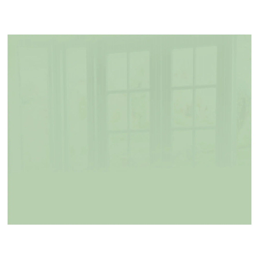 Pastel Green Hob Splashback (898 X 700 X 6mm) SB9070PG, image showing a smooth, pastel green glass splashback with a reflective surface and a window reflection.
