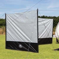 SunnCamp Easy Windbreak displayed on a open field. 