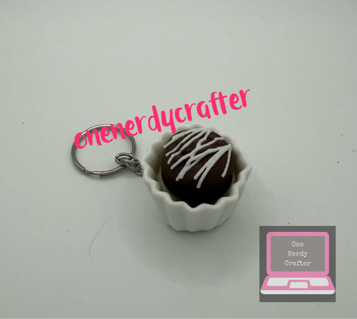 White Topping Chocolate Fidget Clicker Keychain
