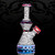 Jake C Glass - Faceted Moonstone over Pomegranate W/ Black & White Chaos Cane