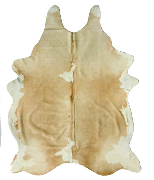 Caramel and white cowhide rug with soft natural pattern