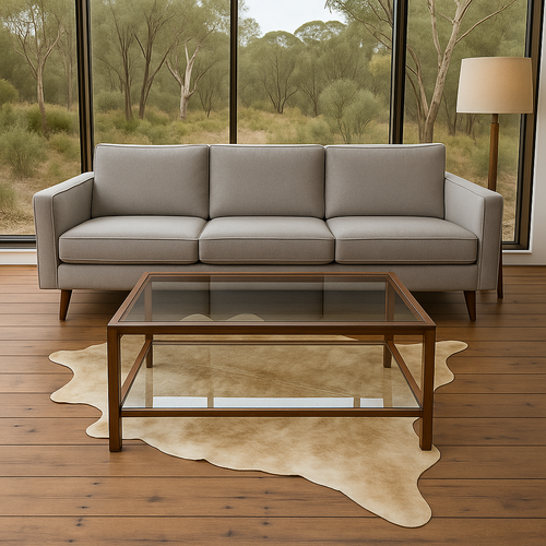 Light  brindle  Cowhide  showing  in  lounge  with  glass  coffee  table  &  bush  view  out  of  display  window
