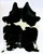 Black and white cowhide rug with bold contrast pattern