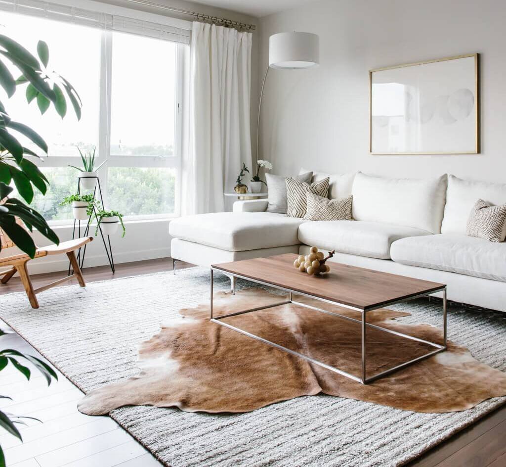 Cowhide Rug Shown in a Modern Lounge setting