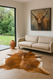 Brindle  Cowhide  in  front  of  Modern Sofa