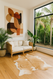 Caramel &White cowhide  rug  in modern  room  setting