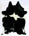 Black and white cowhide rug with bold contrast pattern