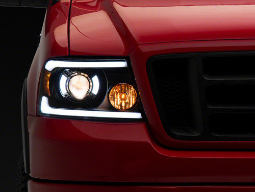 Raxiom 04-08 Ford F-150 Axial Series Projector Headlights with LED Bar- Black Housing- Clear Lens - T566363 Photo - Primary