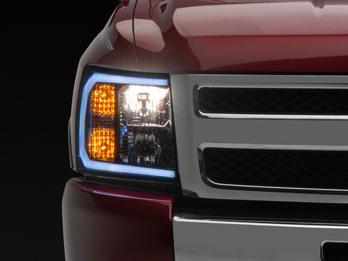 Raxiom 07-13 Chevrolet Silverado 1500 Axial Headlights w/ SEQL LED Bar- Blk Housing (Clear Lens) - S138004 Photo - Primary