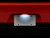 Raxiom 15-23 Dodge Challenger Axial Series LED License Plate Lamps - CH3214 Photo - Close Up