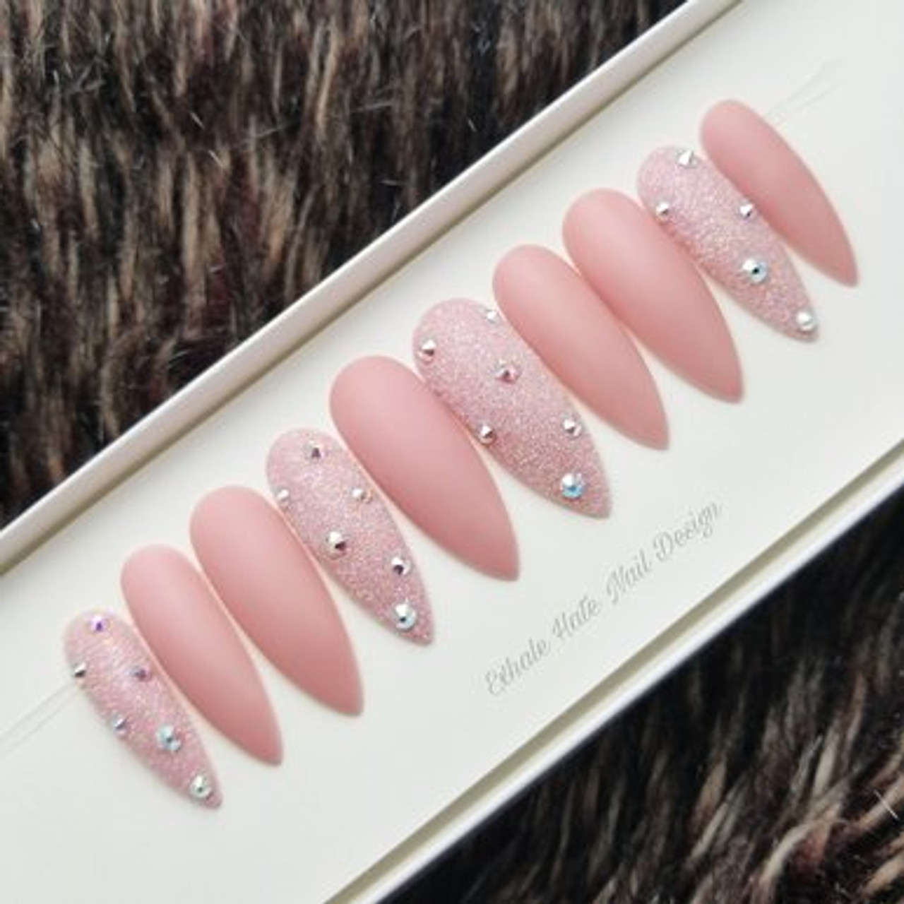 Nude matte with Swarovski crystals nail art