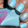 Crystal Blue Persuasion Nail Polish, close-up of manicured nails painted with vibrant, shimmering light blue nail polish.