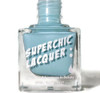 Crystal Blue Persuasion Nail Polish, close-up of a square glass bottle with light blue nail polish, label reads 'SuperChic Lacquer' and 'Marvel The Adventures In Beauty'.