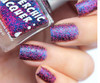Entertaining Angels Nail Polish, close-up of nails painted with this colorful, glittery nail polish featuring pink, blue, and purple sparkles.