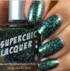 Heaven's Coordinates Nail Polish, vibrant holographic glitter nail polish on fingernails.