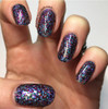 Quickening Nail Polish, glittery multicolor nail polish on fingernails with a glossy finish.