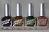 Trap Queen Nail Polish, set of four metallic nail polish bottles in silver caps with colorful holographic labels.