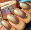 Dart Thru The Heart Nail Polish, glitter holographic nail polish on fingernails showing colorful sparkly finish.