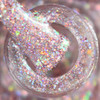 Love Stinks Nail Polish, close-up of glittery multicolor nail polish with holographic sparkles and iridescent effects.