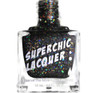 Bittersweet Oil Spill Nail Polish, a clear square glass bottle containing black nail polish with multicolored glitter, labeled 'SUPERCHIC LACQUER'.