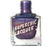 Juju Nail Polish, a shimmering purple nail polish in a clear square bottle with glittery finish and a purple cap.