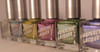 Viral Nail Polish, set of colorful holographic nail polishes with shiny, glittery finishes in different shades.
