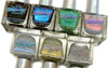 Fly Away Nail Polish, collection of glittery and holographic nail polish bottles with colorful and shimmering finishes.