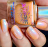 Distortion Nail Polish, holographic peach-colored nail polish bottle with iridescent nails.