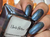 Uncle Arthur Nail Polish, metallic blue-green gel nail polish on fingernails.