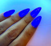 Blue Flame Neon Shimmer Nail Polish, vibrant blue nail polish applied on fingernails with a neon shimmer effect under bright lighting.
