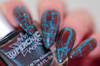 Harlequin NutCrackle Nail Polish - Multichrome Crackle Effects, close-up of fingernails with multichrome crackle nail polish in blue and red hues with a crackled finish.