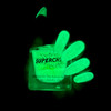 Boo Moon Green Halloween Nail Polish, glow-in-the-dark blue-green nail polish with a black cap and label, glowing in the dark to create a spooky Halloween effect.