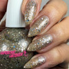 Chronicles Of The Dreamcatcher - Genuine Diamond Nail Polish, close-up of fingernails painted with sparkling glittery gold nail polish containing silver and black glitter and a matching nail polish bottle.
