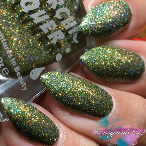 Boots On The Ground Nail Polish, close-up of fingernails painted with holographic glitter nail polish with a multi-colored sparkle.